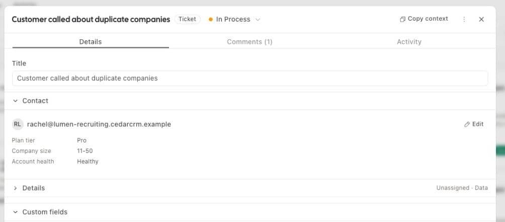 Ticqex contact panel in the ticket modal showing contact details and custom fields
